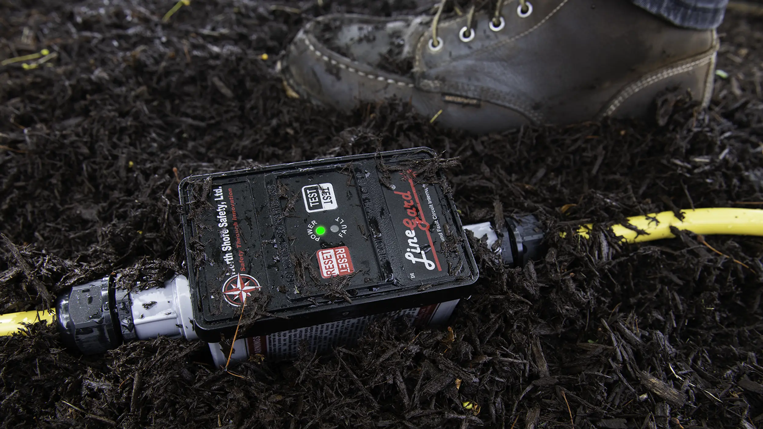 image of North Shore Safety 30 amp GFCI in wet soil
