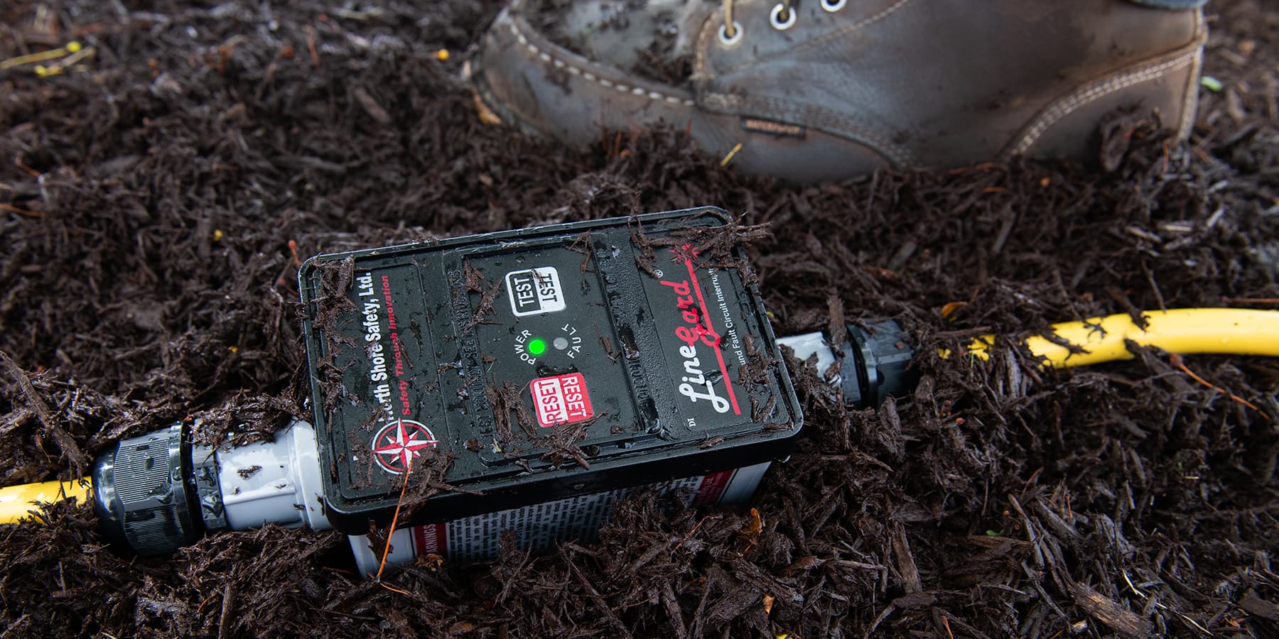 image of North Shore Safety 30 amp GFCI in wet soil